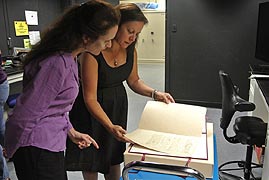 [photo, Dr. Fenella France, Chief, Preservation Research & Testing Division, Library of Congress, & Vicki Lee, Director, Conservation & Preservation, examining George Washington letter of resignation prior to hyperspectral imaging, Conservation Lab, State Archives, Annapolis, Maryland]